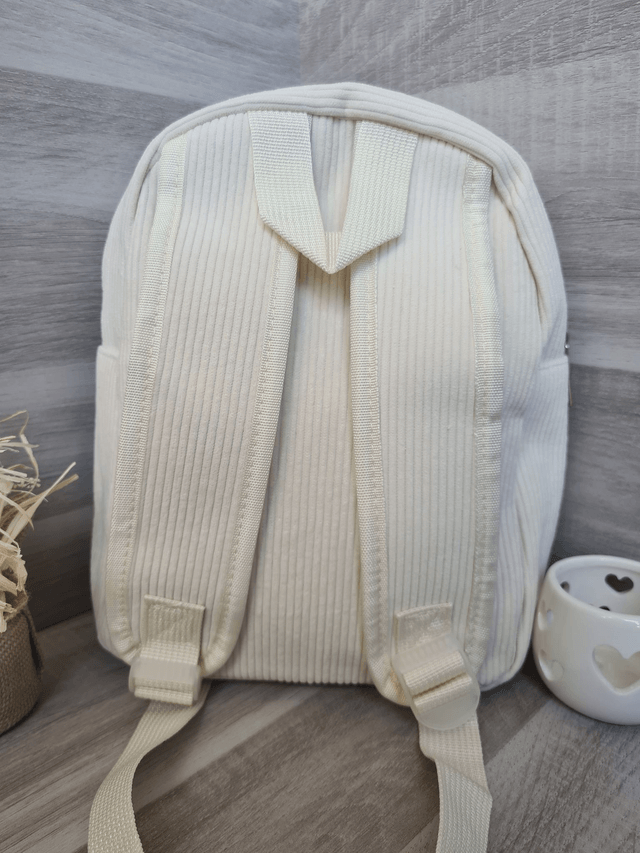 Sac à dos enfant beige pattes rose